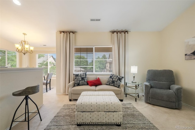 sitting room featuring an inviting chandelier