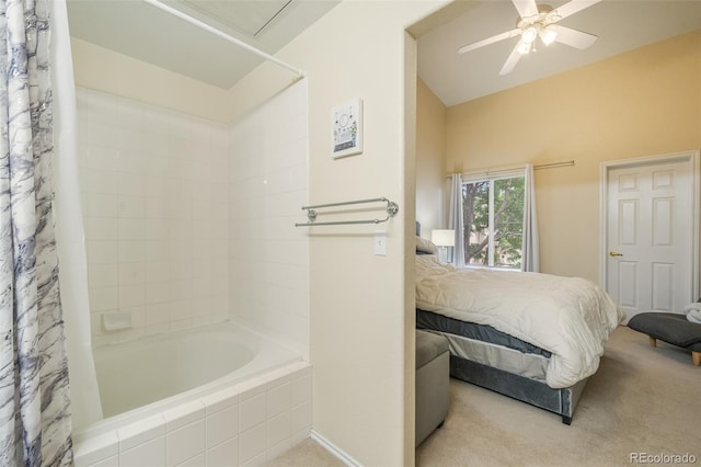 bathroom featuring ceiling fan and shower / bath combo