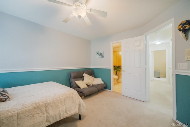 bedroom with ceiling fan and light colored carpet