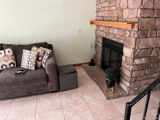 2285 S Jasper Way Unit A, Aurora, CO 80013 - tiled living room with a fireplace and baseboards