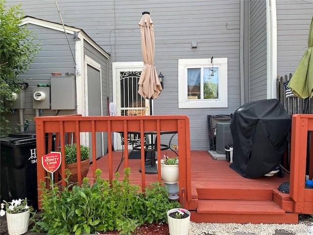 2285 S Jasper Way Unit A, Aurora, CO 80013 - wooden terrace featuring a grill and outdoor dining area