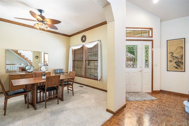9873 Greensview Cir, Lone Tree, CO 80124 - dining space featuring a ceiling fan, stairs, arched walkways, ornamental molding, and a towering ceiling
