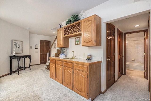 9873 Greensview Cir, Lone Tree, CO 80124 - kitchen featuring light colored carpet, tile countertops, and recessed lighting