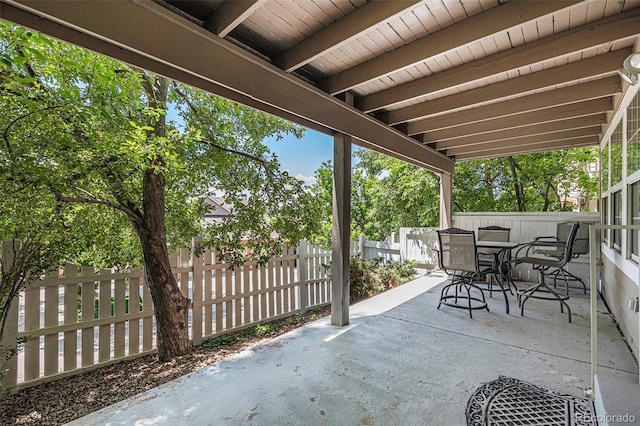 9873 Greensview Cir, Lone Tree, CO 80124 - fenced backyard featuring outdoor dining space and a patio