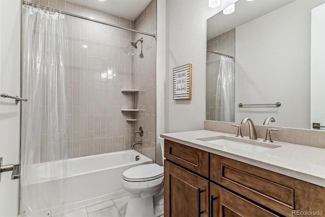 full bathroom featuring tile patterned flooring, toilet, vanity, and shower / bath combo with shower curtain