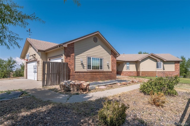 ranch-style home with a garage