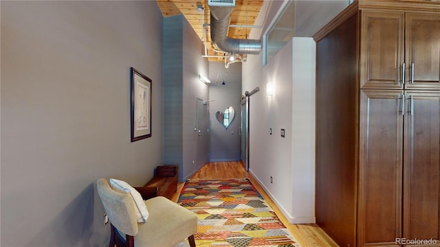 1745 Wazee St Unit 4H, Denver, CO 80202 - corridor featuring light wood finished floors and baseboards