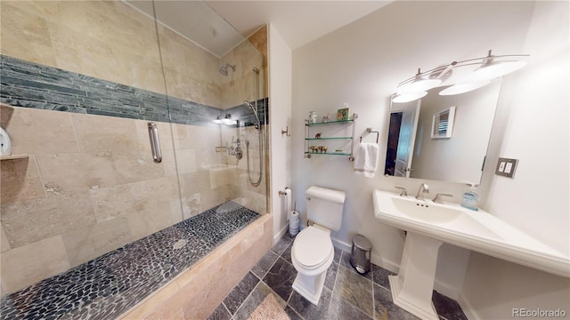 1745 Wazee St Unit 4H, Denver, CO 80202 - bathroom featuring a shower stall and granite floors