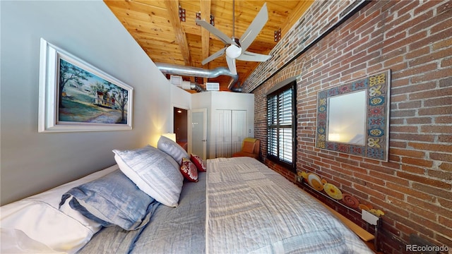 1745 Wazee St Unit 4H, Denver, CO 80202 - bedroom with a wooden ceiling with exposed beams, brick wall, a high ceiling, and a closet