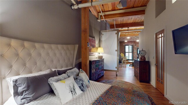 1745 Wazee St Unit 4H, Denver, CO 80202 - bedroom with wood finished floors and a wood ceiling with exposed beams