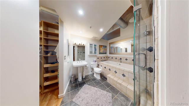 1745 Wazee St Unit 4H, Denver, CO 80202 - bathroom featuring a garden tub, a shower stall, recessed lighting, and tile patterned flooring