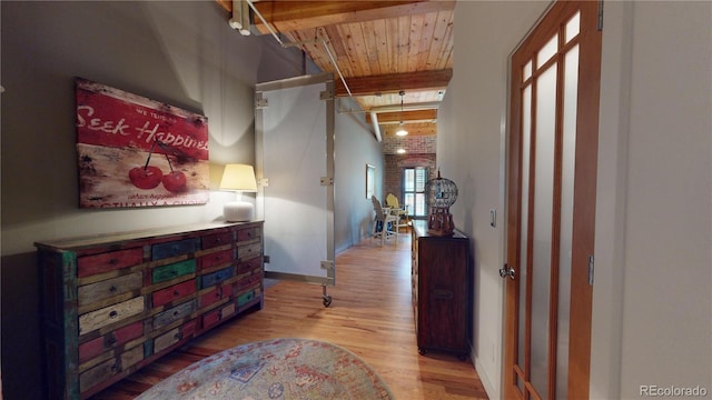 1745 Wazee St Unit 4H, Denver, CO 80202 - corridor with wood finished floors and a wooden ceiling with exposed beams