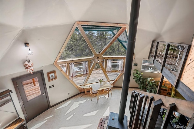 interior space featuring high vaulted ceiling