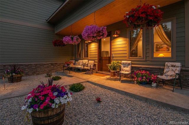 exterior space featuring outdoor lounge area and a patio area