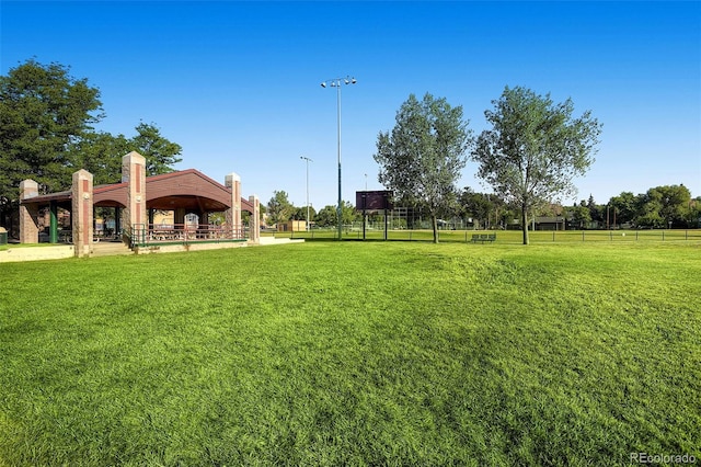 view of yard with a gazebo and fence