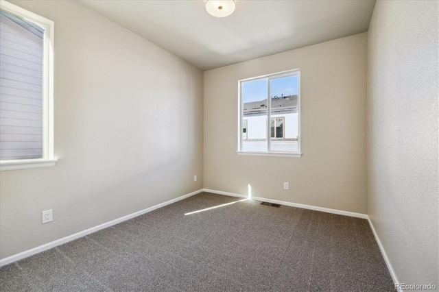 view of carpeted spare room