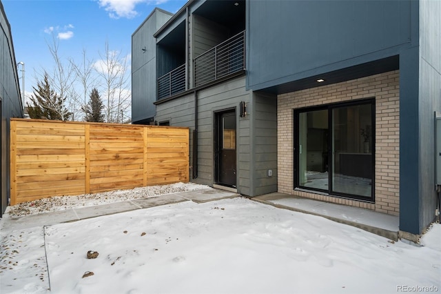 view of snow covered patio