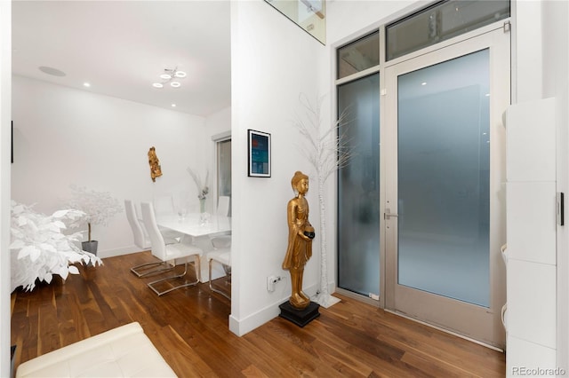 bathroom with hardwood / wood-style floors