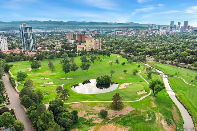 bird's eye view with a water and mountain view