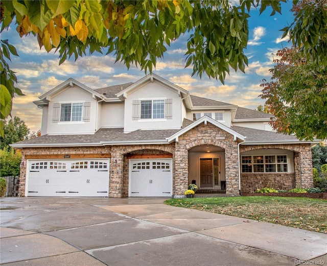 view of front of home with a garage