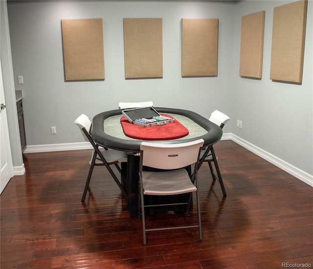 dining space featuring dark hardwood / wood-style flooring