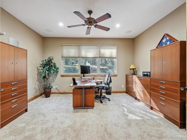 office featuring ceiling fan, recessed lighting, baseboards, and light carpet