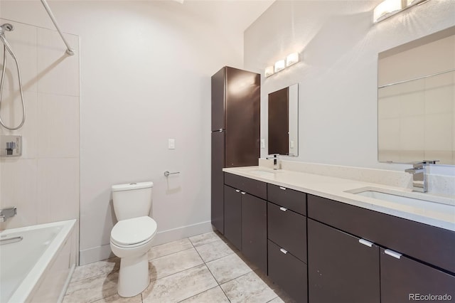 full bathroom featuring tile patterned floors, vanity, toilet, and tiled shower / bath