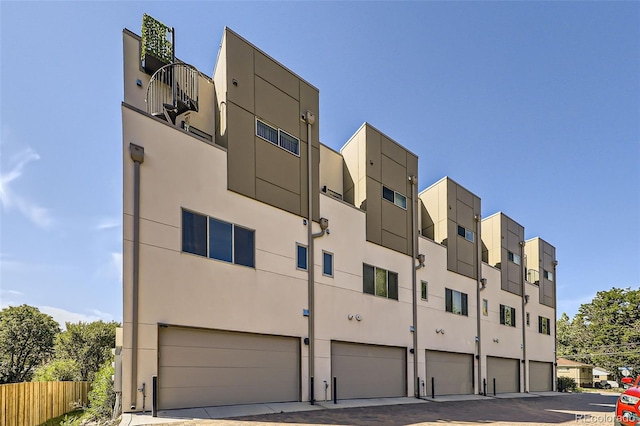 view of building exterior with a garage