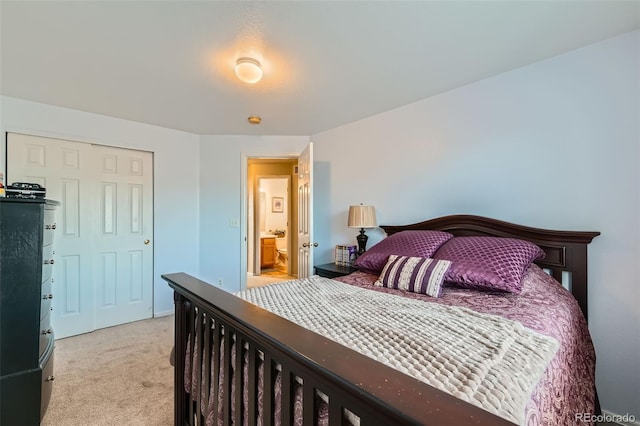 carpeted bedroom featuring a closet