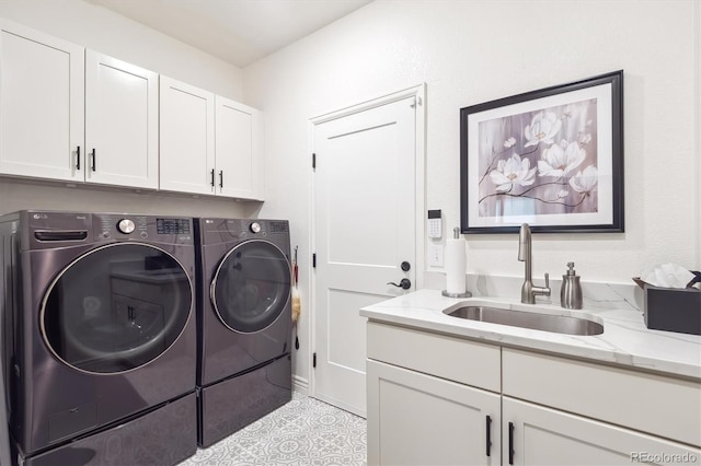 1026 Deer Clover Way, Castle Pines, CO 80108 - washroom featuring separate washer and dryer, cabinet space, and light tile patterned floors