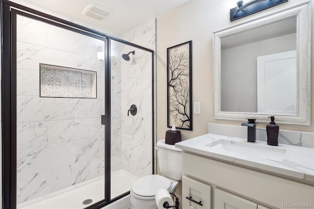 1026 Deer Clover Way, Castle Pines, CO 80108 - bathroom featuring toilet, vanity, and a stall shower
