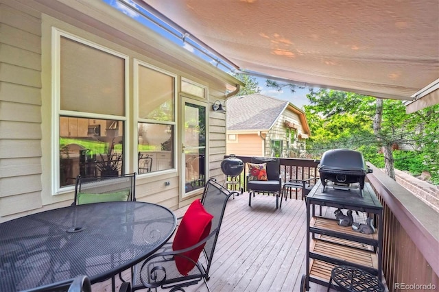1026 Deer Clover Way, Castle Pines, CO 80108 - wooden deck featuring outdoor dining space