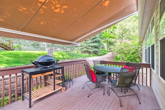 1026 Deer Clover Way, Castle Pines, CO 80108 - wooden terrace with outdoor dining space