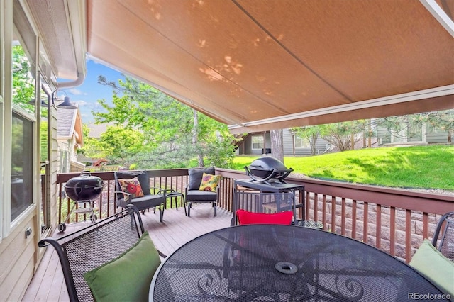 1026 Deer Clover Way, Castle Pines, CO 80108 - wooden terrace featuring outdoor dining area, grilling area, and a yard