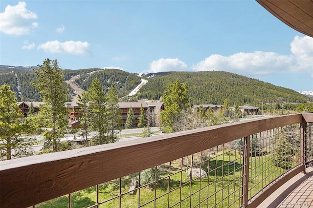 22787 US Highway 6 Unit 302, Keystone, CO 80435 - view of mountain backdrop with a heavily wooded area