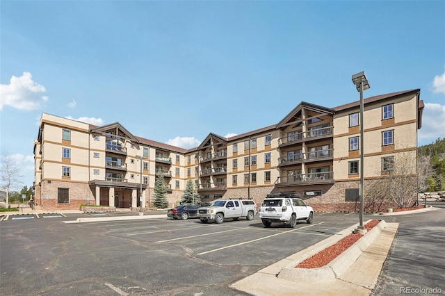 22787 US Highway 6 Unit 302, Keystone, CO 80435 - view of apartment building / complex with uncovered parking