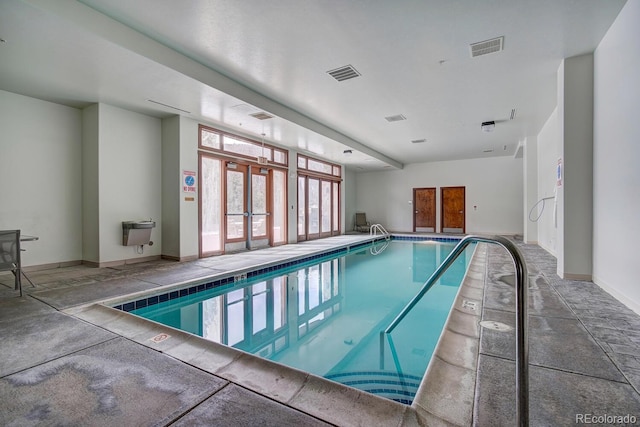 22787 US Highway 6 Unit 302, Keystone, CO 80435 - indoor pool featuring french doors