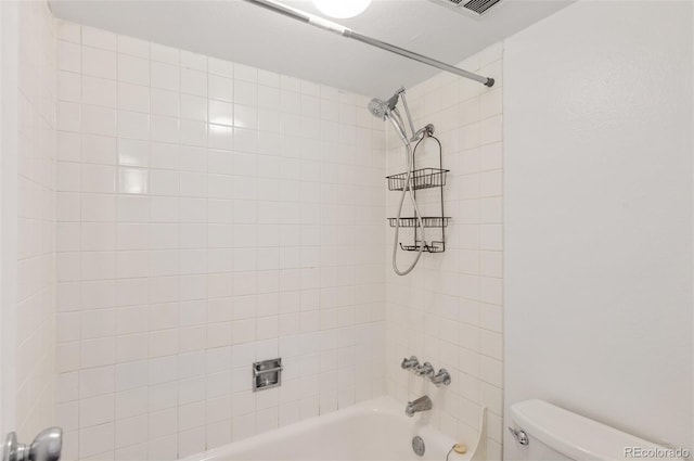 bathroom featuring toilet and shower / washtub combination