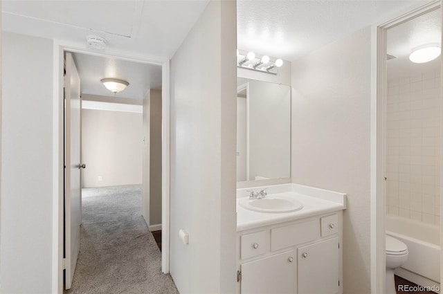 full bath featuring toilet, shower / washtub combination, and vanity