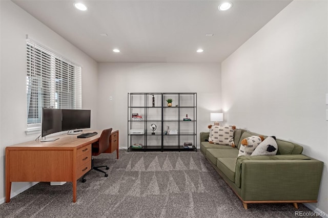 home office featuring dark colored carpet