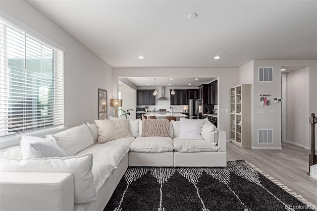 living room featuring light wood-type flooring