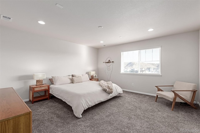 bedroom featuring dark colored carpet