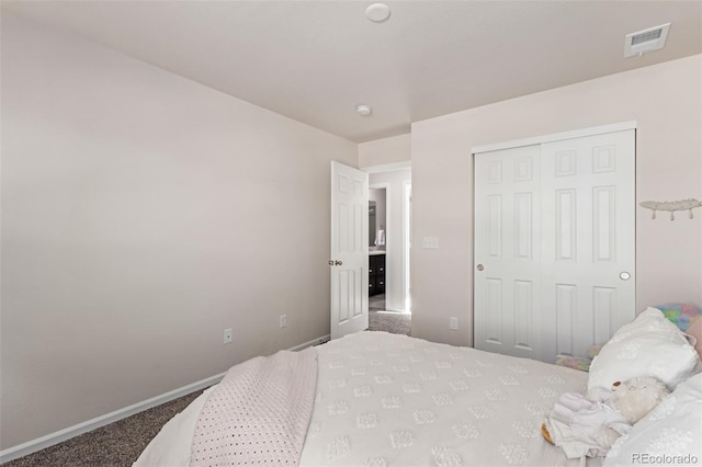 carpeted bedroom with a closet