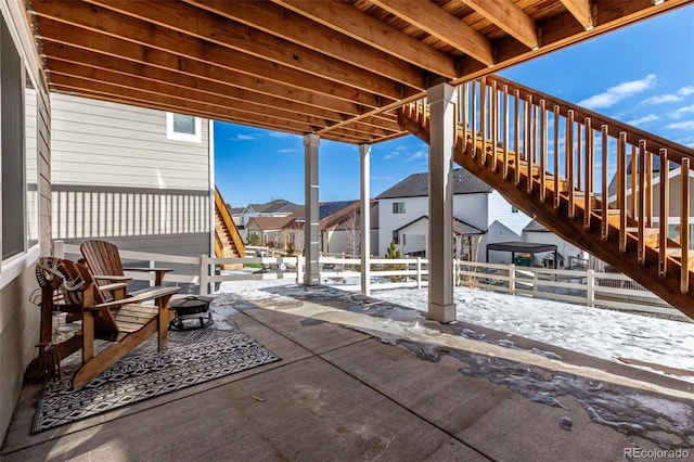 view of snow covered patio