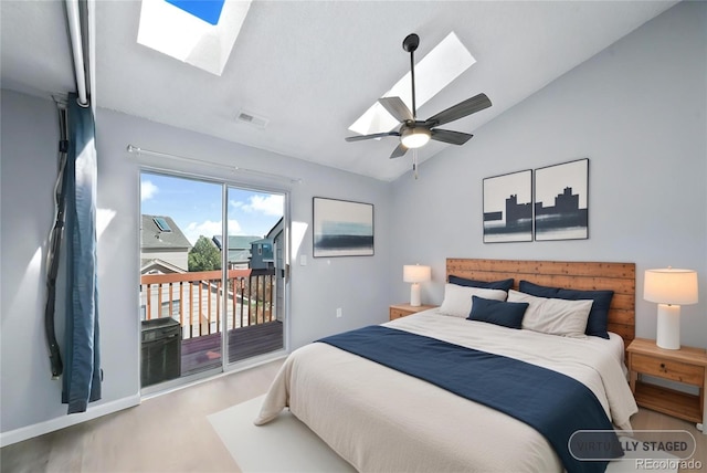 bedroom with access to exterior, ceiling fan, vaulted ceiling, and hardwood / wood-style flooring