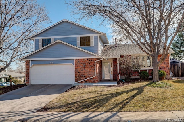 view of front of property with fence, concrete driveway, an attached garage, a front yard, and brick siding