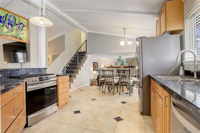 kitchen with pendant lighting, a sink, appliances with stainless steel finishes, light tile patterned floors, and vaulted ceiling with beams