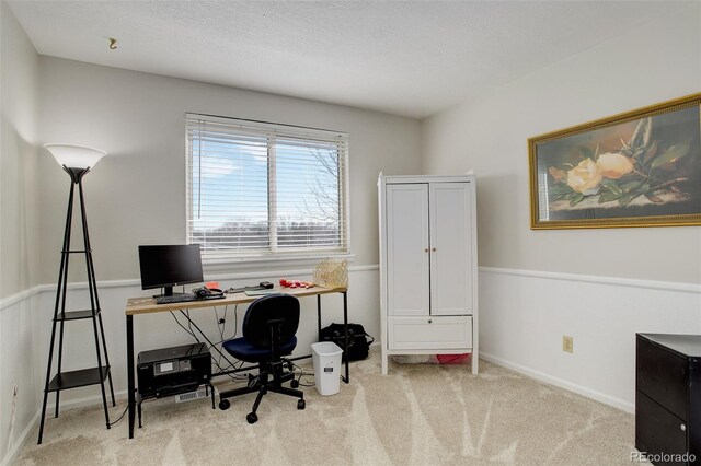 office area featuring carpet flooring and baseboards