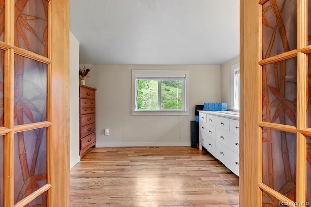 2874 SE Grapevine Rd, Idledale, CO 80453 - unfurnished bedroom featuring light wood finished floors and baseboards
