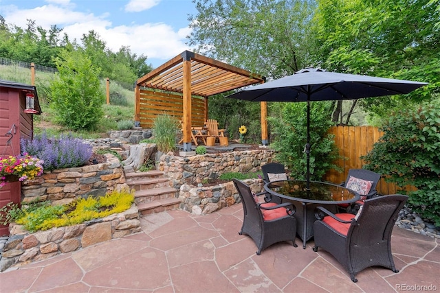 2874 SE Grapevine Rd, Idledale, CO 80453 - view of patio / terrace with outdoor dining area